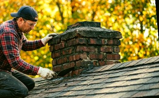 Crown set on a Brookline chimney amid falling leaves