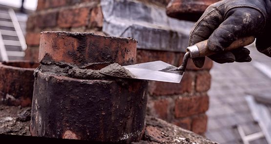Mortar bed struck around a chimney pot
